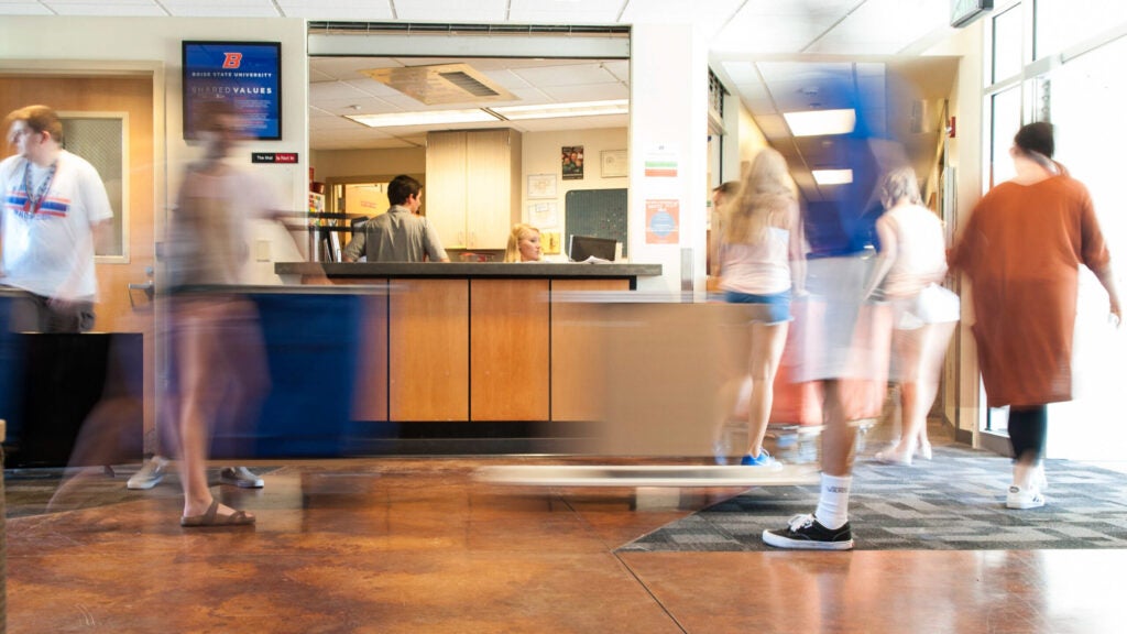 Long exposure shot of students moving into Keiser Hall