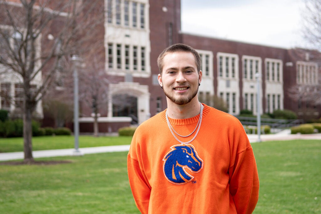 Derek Pyatt poses on the quad at Boise State