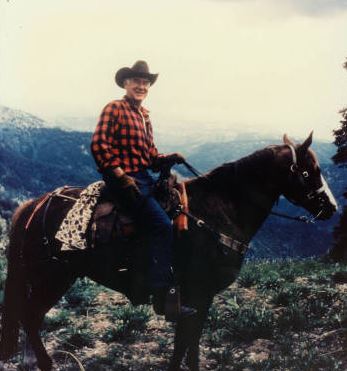 Cecil Andrus on horseback
