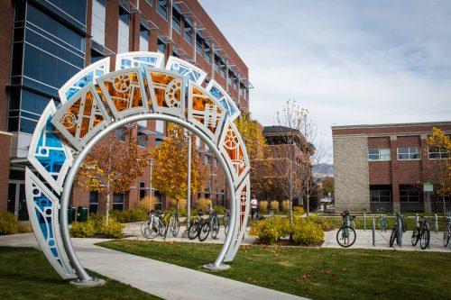Image of blue and yellow circular art sculpture