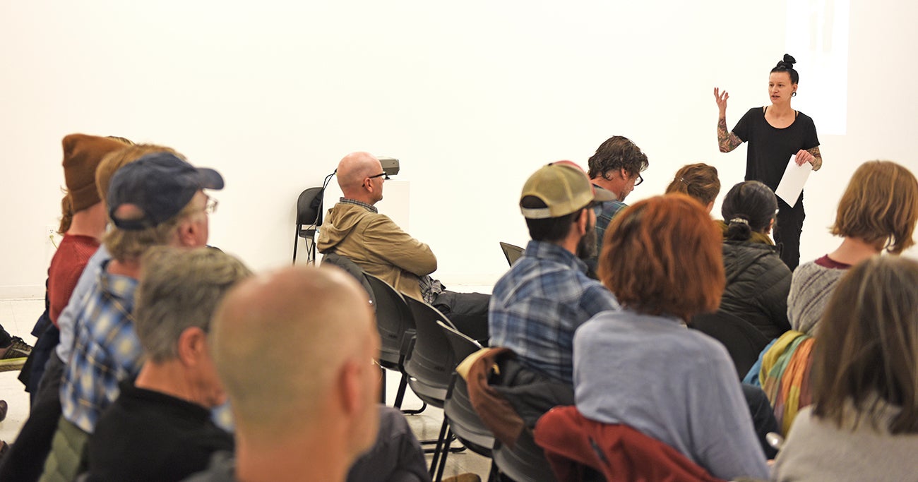 Graduate faculty at critique