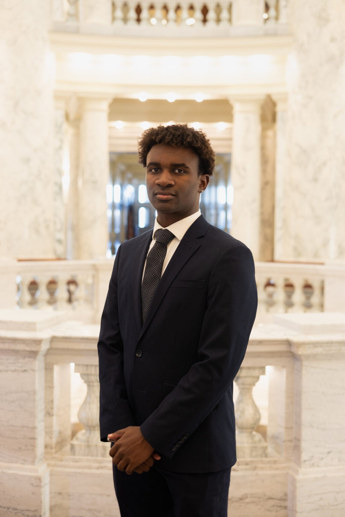 Josiah DeChambeau standing in the Idaho Capitol Rotunda