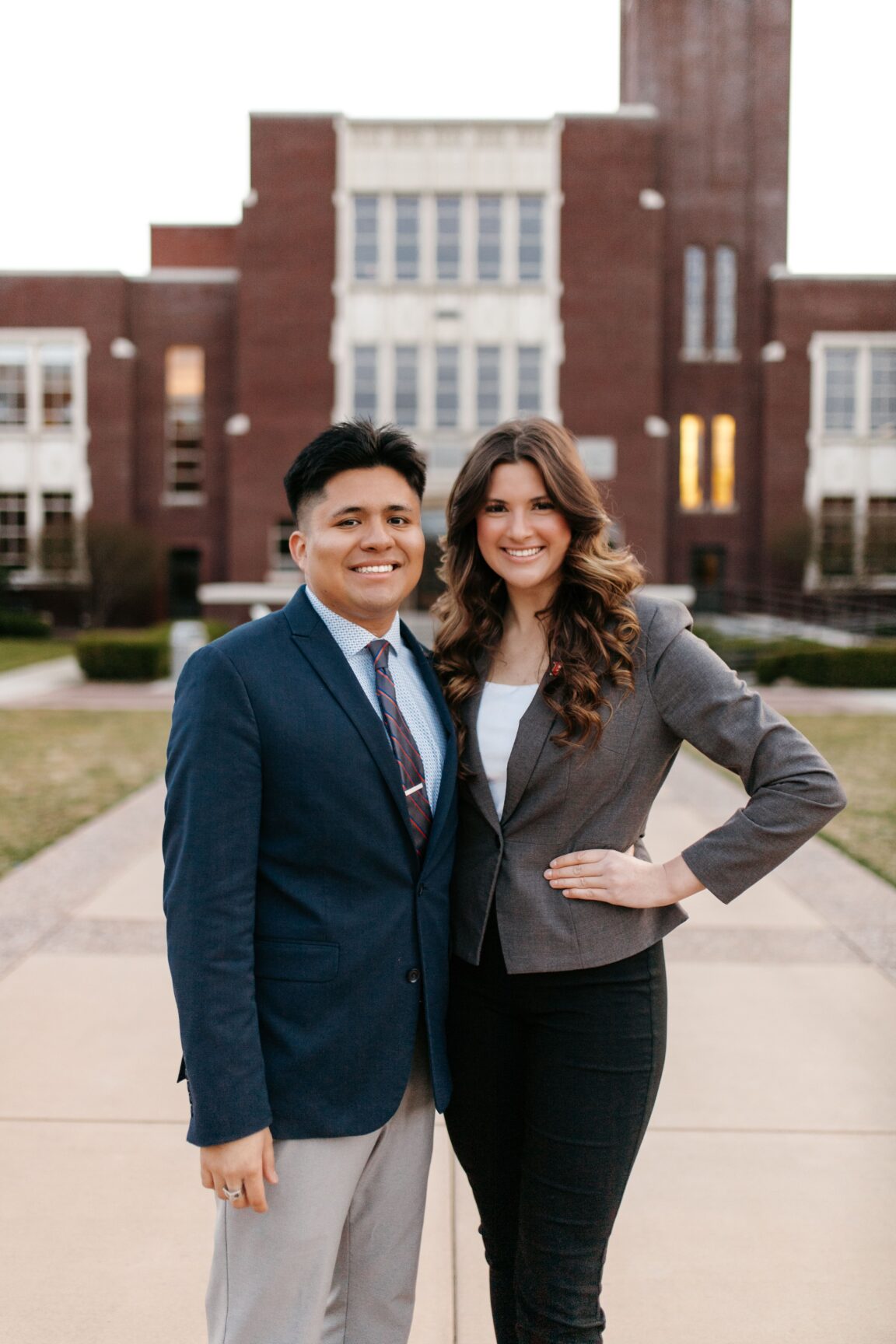 Isaac Celedon and Kate Perkes standing next to each other, smiling