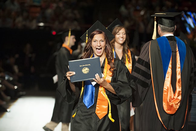 Athletic training student in regalia at Commencement