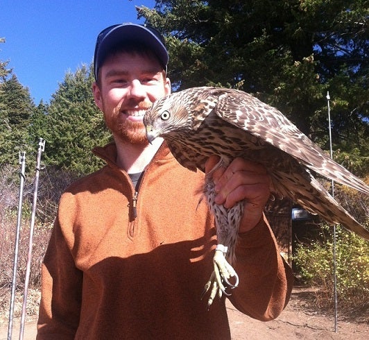Casey Pozzanghera holding bird
