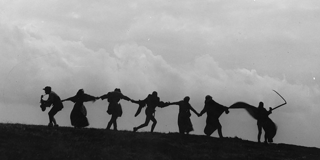 people dancing and playing music with death, photo