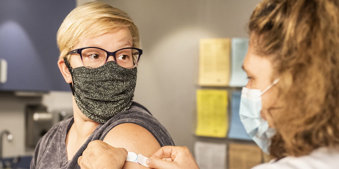 woman receiving vaccine
