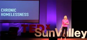 image of vanessa fry presenting on stage