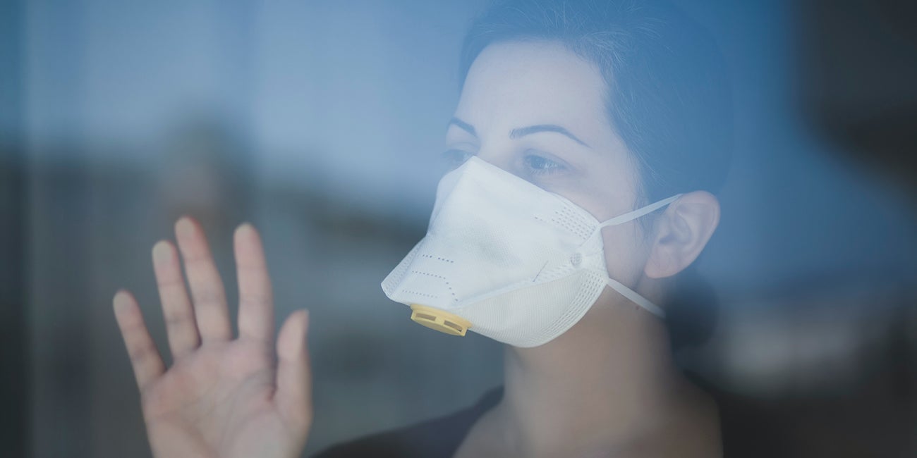 image of sad woman in mask