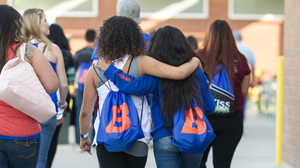 2 students with Boise State backpacks
