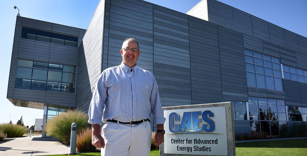 Paul Smith standing next to CAES building
