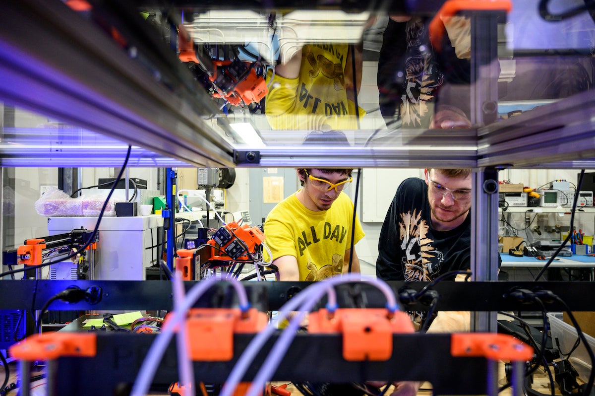 students work with equipment