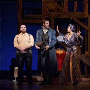 Three student actors performing in a play