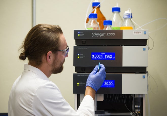 Tyson Hardy in Owen McDougal's Chemistry and Biochemistry Lab, Allison Corona photo