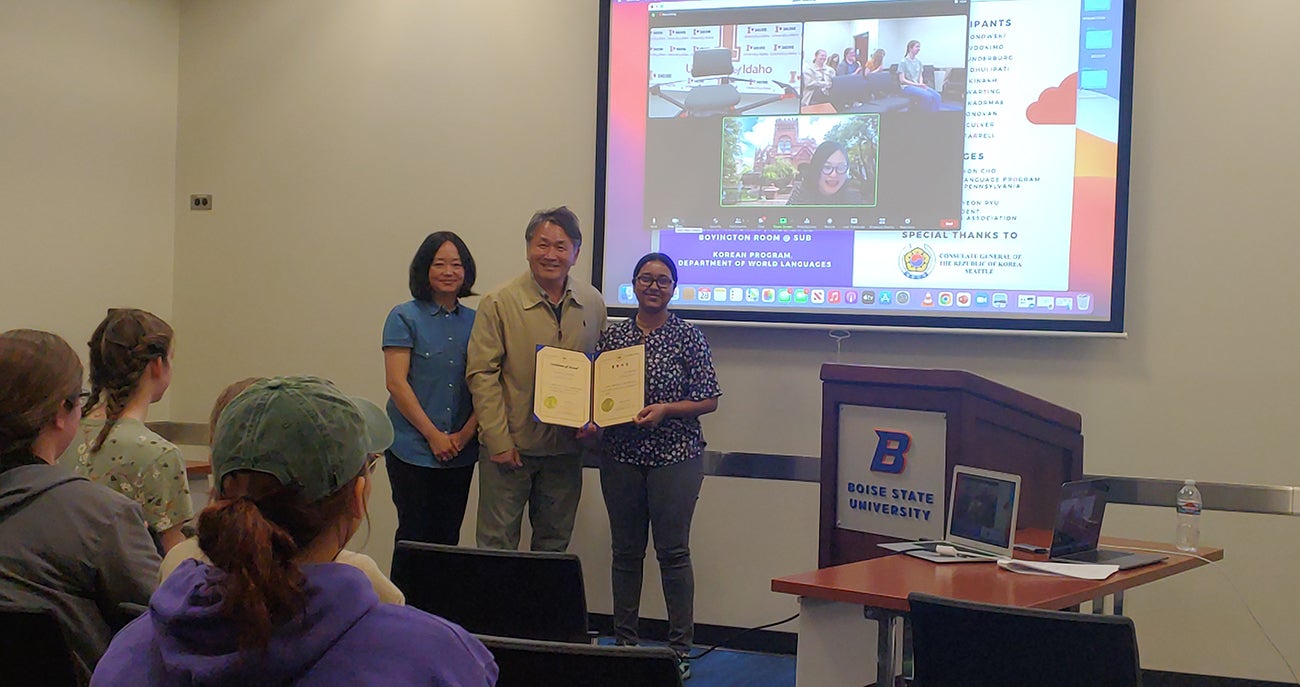 Yookyung Lee, Jae Hyeon Ryu, and Chithkala Dhulipati, winner of the Fifth Annual Korean Language Speaking Contest, and Ms. Haewon Cho (in the screen)