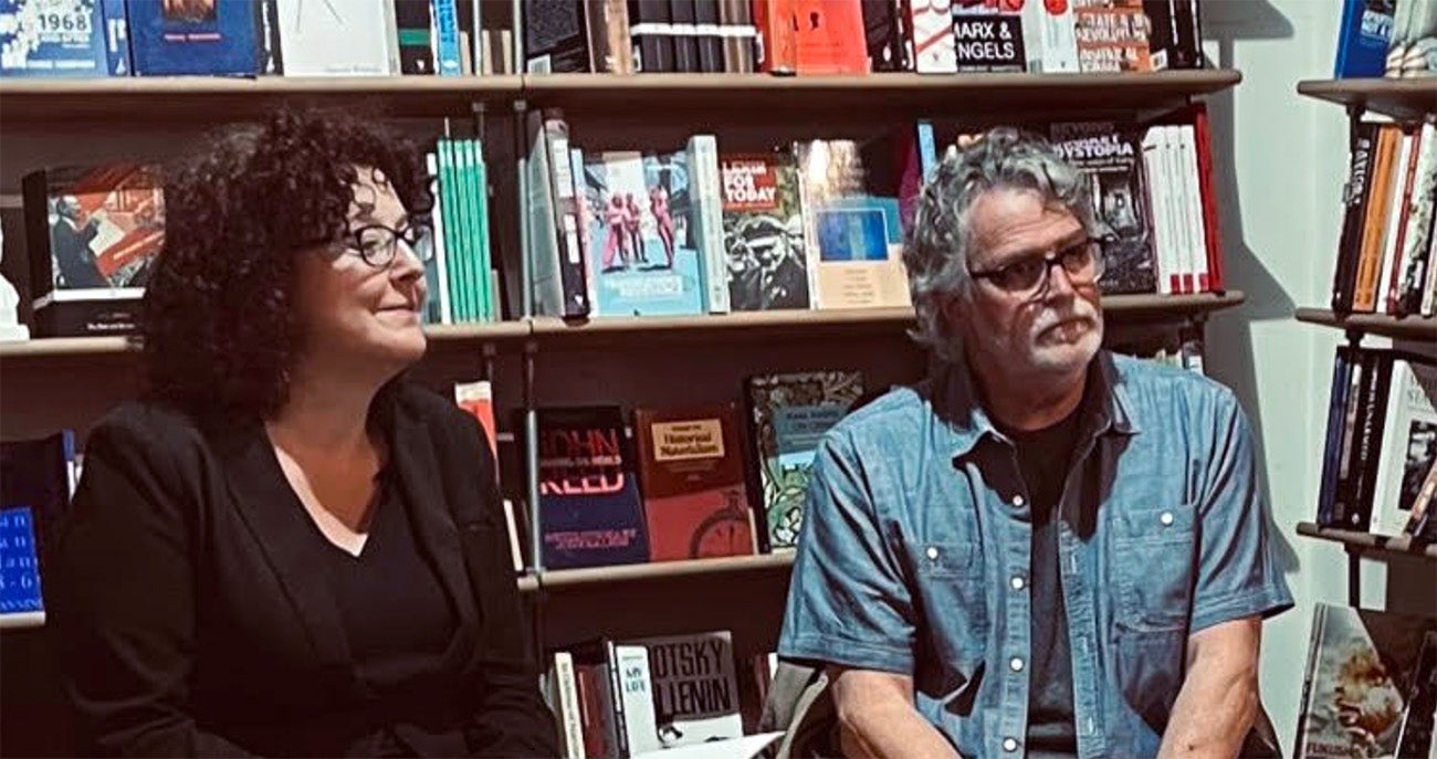 English professor Clyde Moneyhun presenting translations of Catalan poetry in a bookstore in London, UK in April 2022