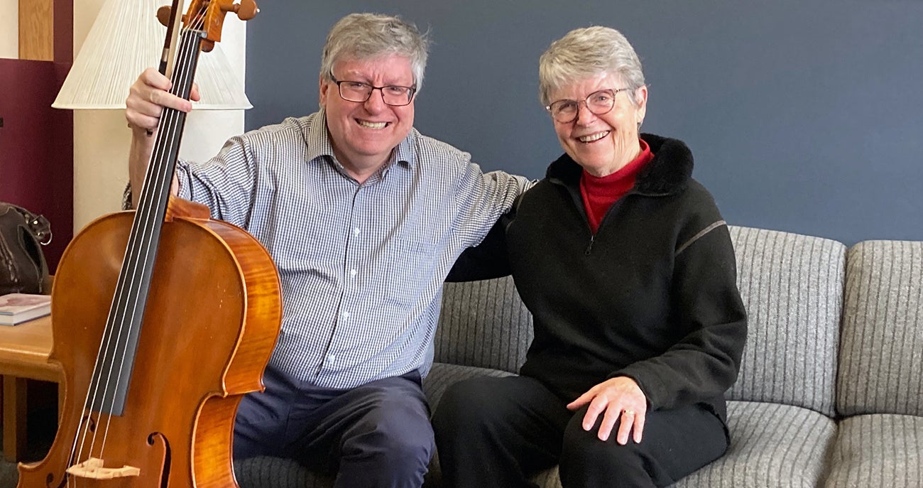 Craig Purdy, professor of violin and director of orchestras for the Boise State Department of Music along with Patricia Young who donated a cello to the Boise State Chamber Music Society for student use in the music department.