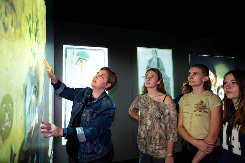 Terra Feast guides student groups through the Luminary.