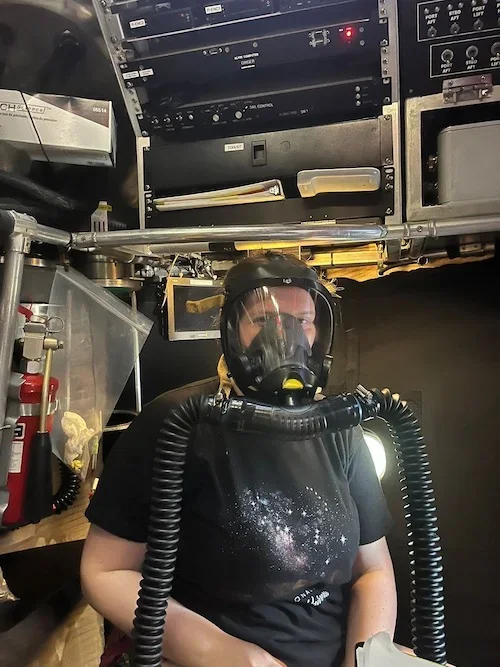 Jess being fit for her oxygen mask in Alvin