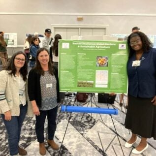 Persons at a research poster conference
