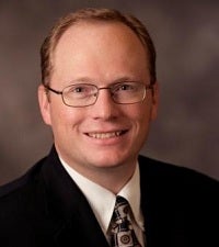 Travis D. Jensen headshot