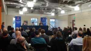 attendees at the Executive MBA Leadership Forum from back of room