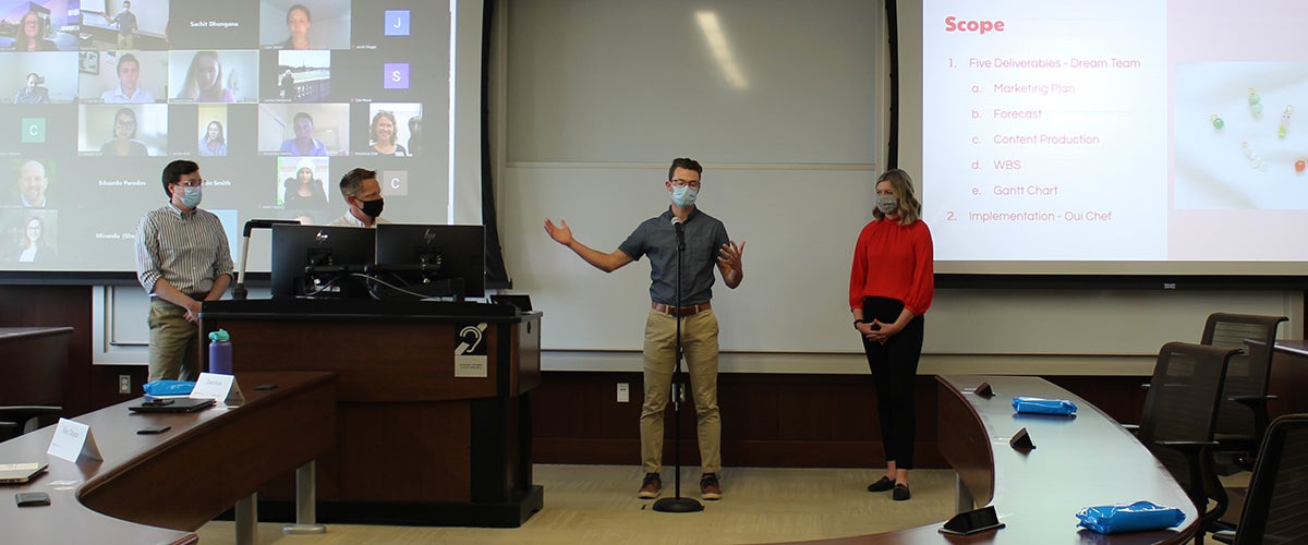 Career Track MBA students Zack Betts, David Rule, Dakota Bruneau and Riley Clayeux presenting on behalf of Team Oui Chef
