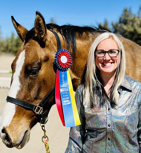 amanda miller with her award-winning horse