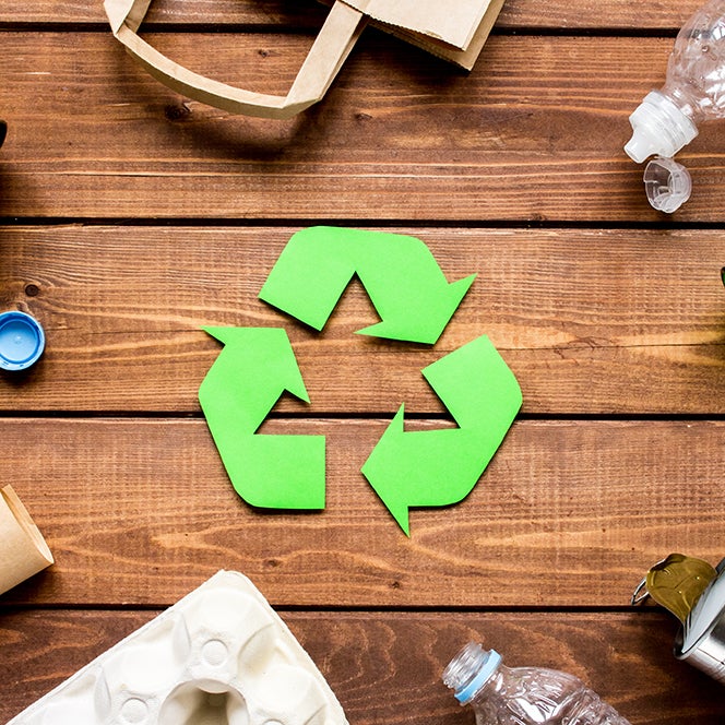 recycle symbol - 3 green arrows in a circle