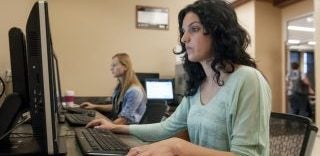 students using computers in the Micron Business and Economics Building at Boise State