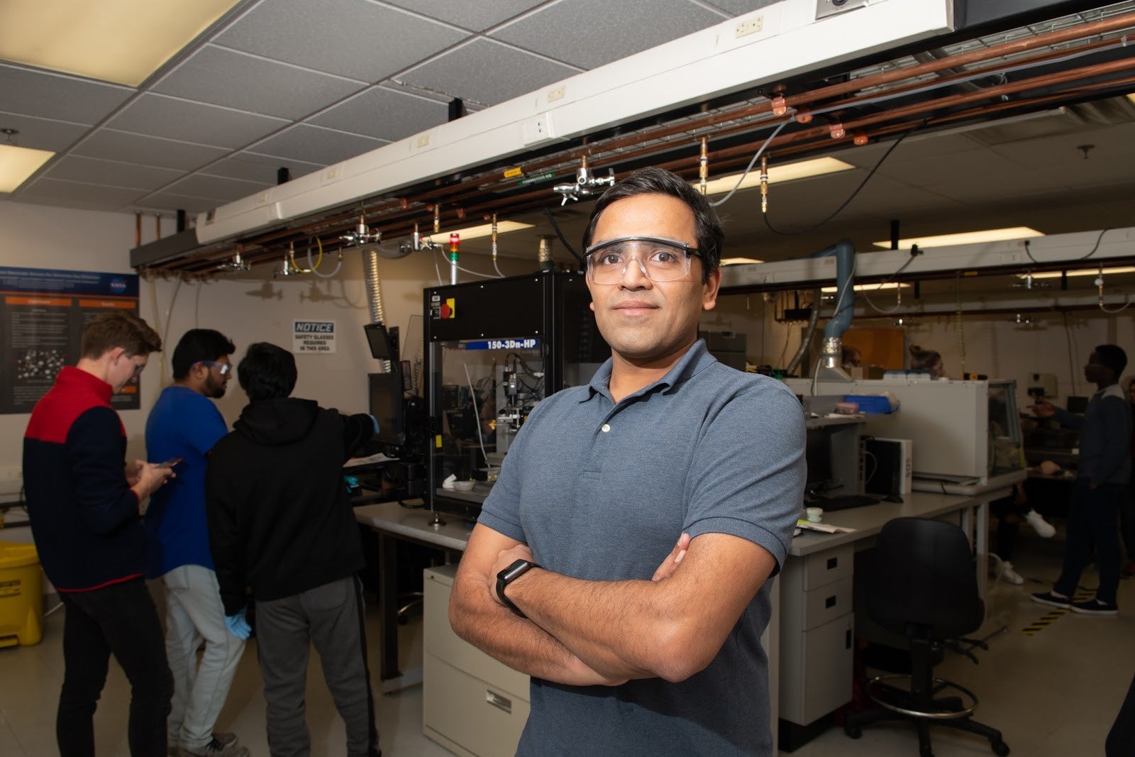 Harish Subbaraman in a lab