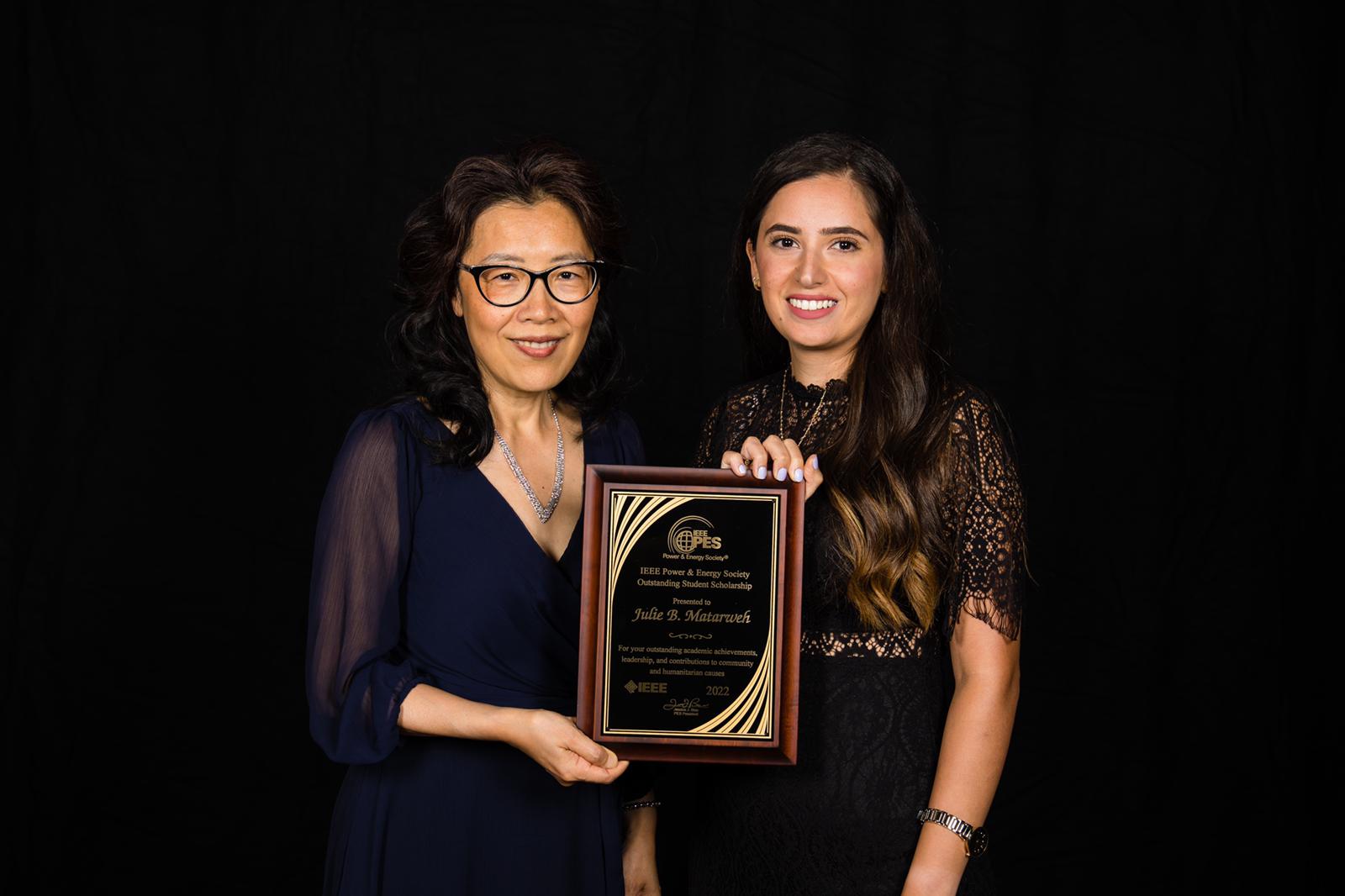 Julie Matarweh (right) receiving award