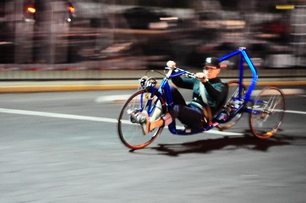 man on a three wheeled bike