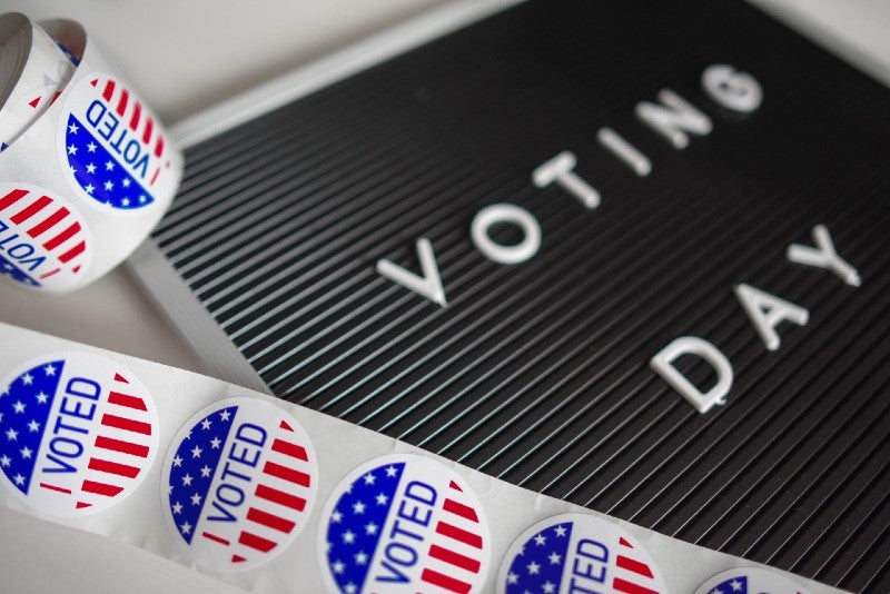 voting stickers and voting day sign