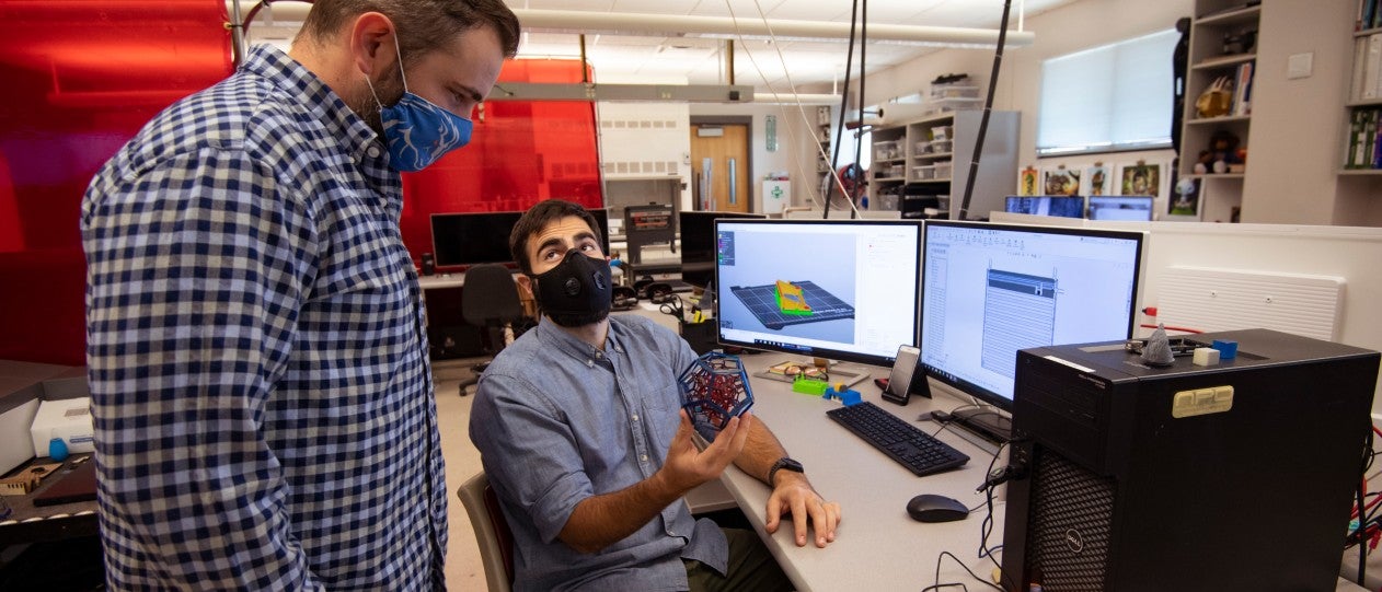 two men working in the NPD lab