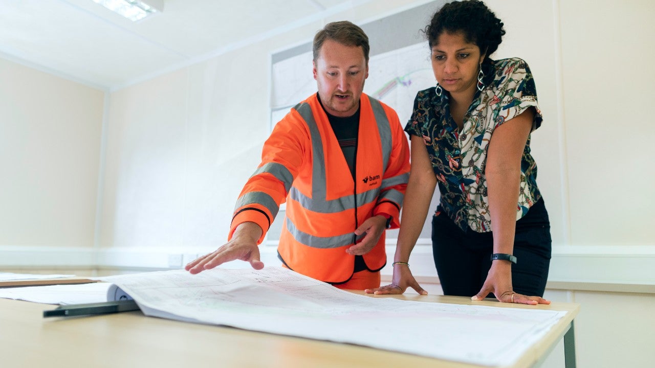 engineers reviewing plans