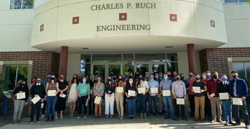 members of the Order of the Engineer in front of the Engineering building