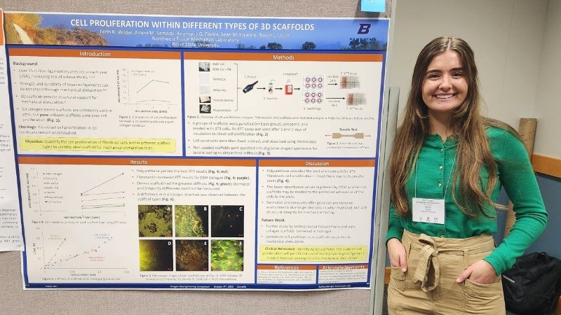 Faith Wilder with poster at 2022 OBS