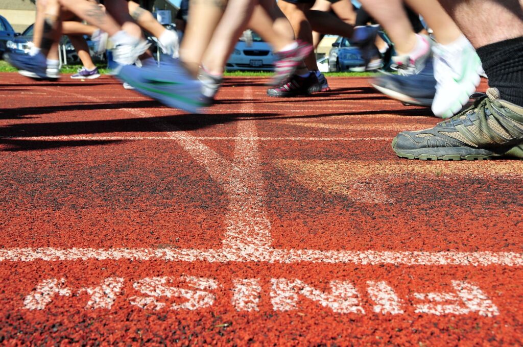 feet crossing a finish line