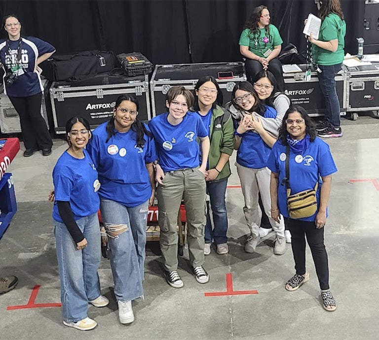 The Chickadees’ posing for a picture at a competition.