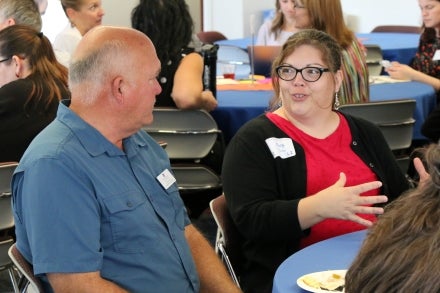New faculty members meet and talk