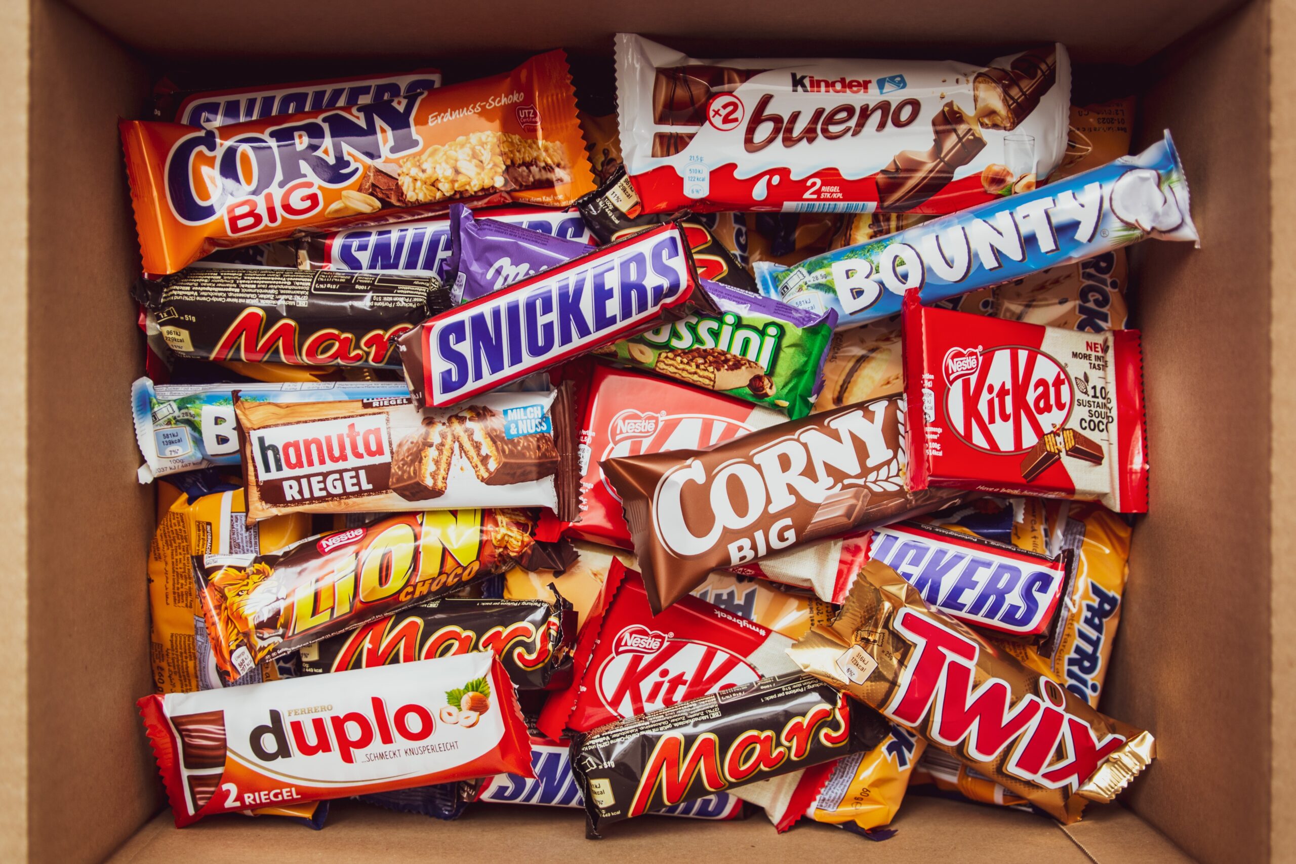 Candy bars stacked on top of each other in a box