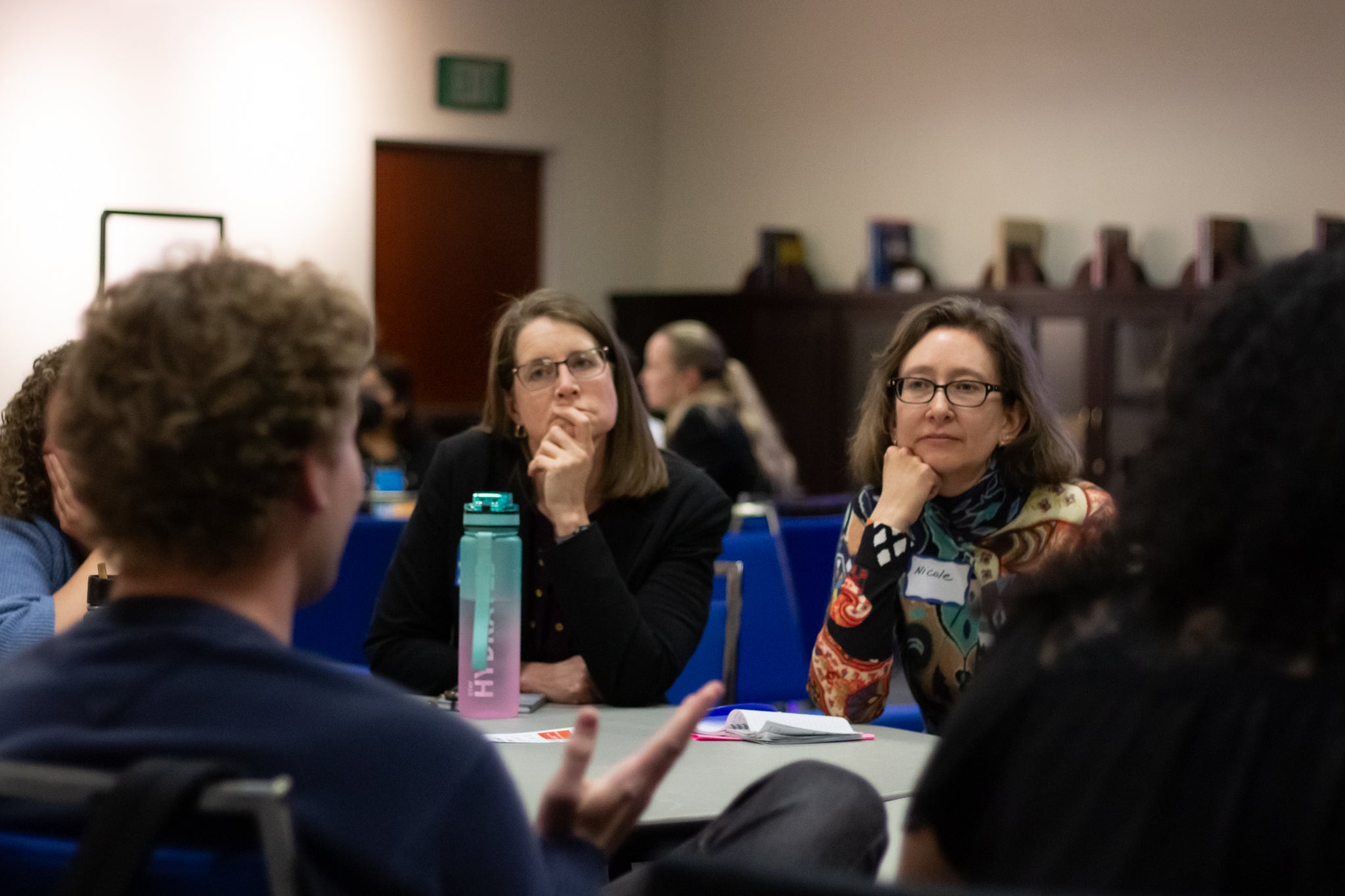 Student speaks to faculty