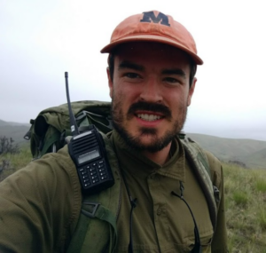 Jake Anderson in the field with gear