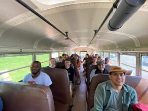 participants sitting on the bus