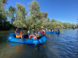 participants floating in rafts