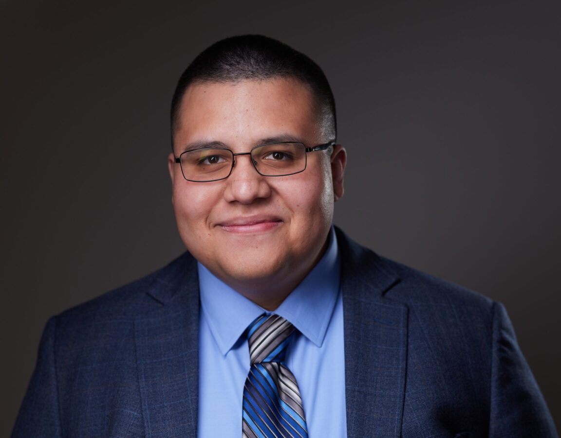 Photo of graduating McNair Scholar Josue Torres-Fonseca