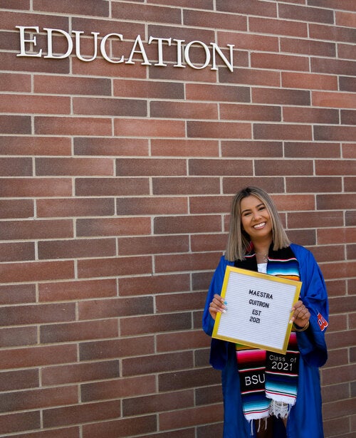 Cynthia Guitron in graduation robe. 