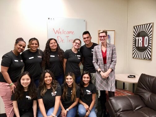 Guitron and other TRIO students with President Tromp. 