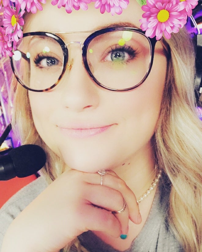 Lexie wearing a headset and glasses